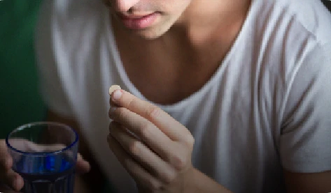 Doctor marking a patient's scalp before a hair transplant procedure